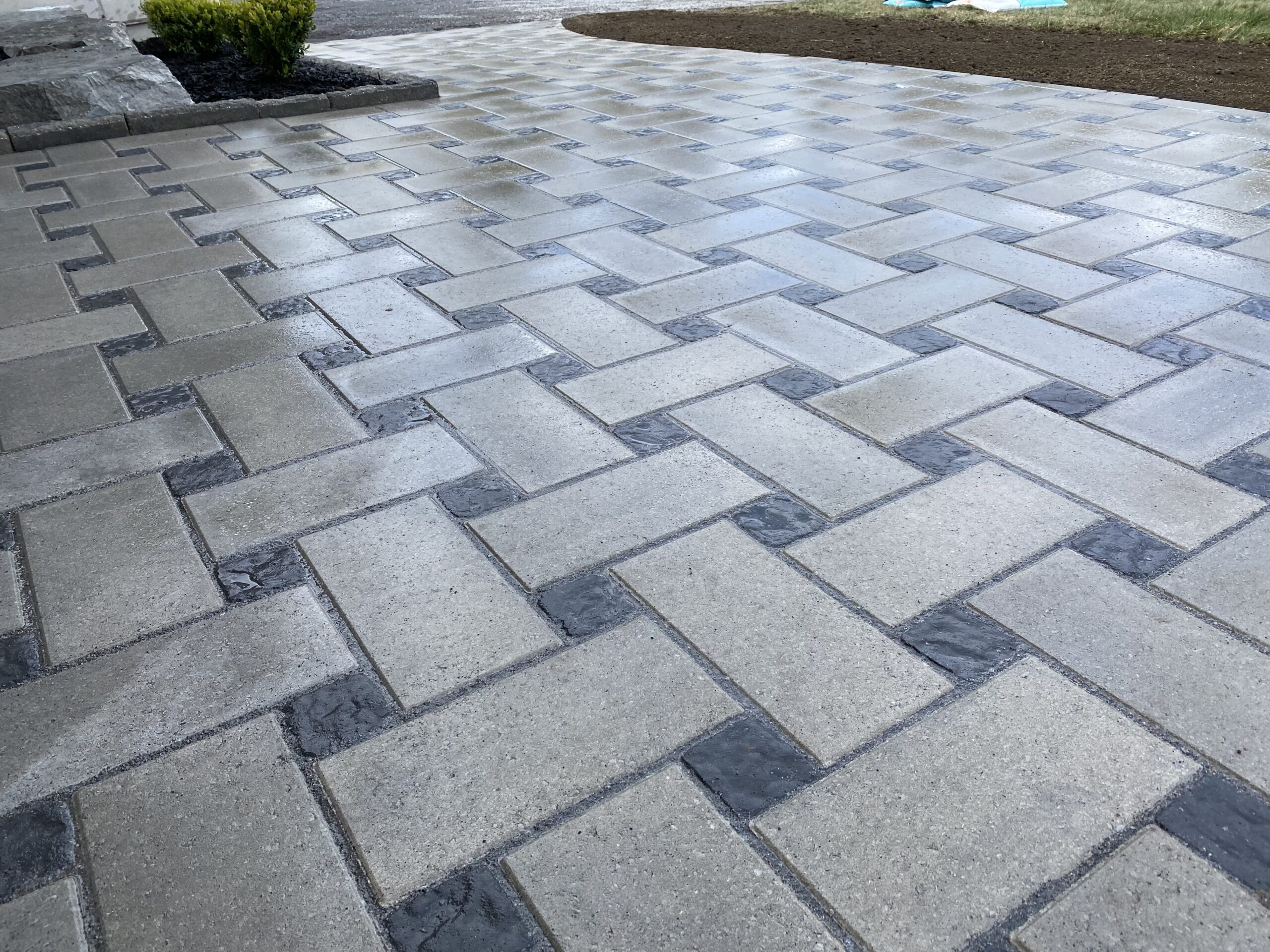 Brick driveway with herringbone pattern